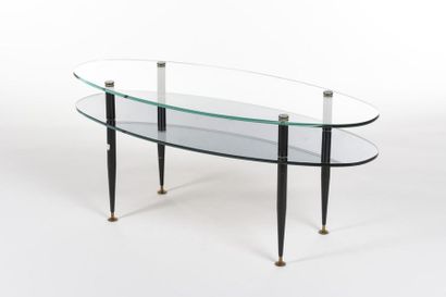 null TRAVAIL 1950
Table basse à double plateaux en verre transparent et opalin noir...