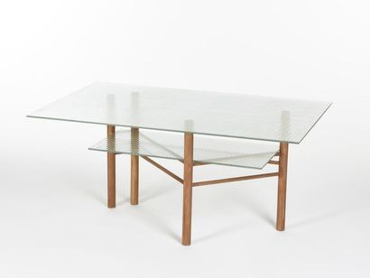 null TRAVAIL D'ARCHITECTE
Table basse à quatre montants en bois cylindrique reliés...