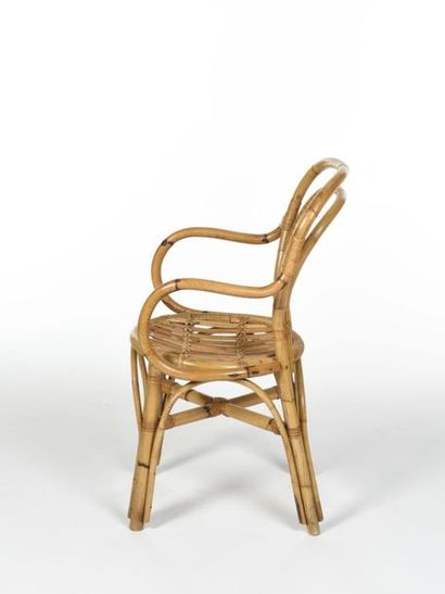 null TRAVAIL 1960
Suite de six chaises à accoudoirs en rotin et bambou.
Circa 1960
H:...