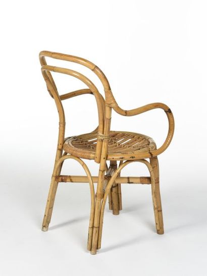 null TRAVAIL 1960
Suite de six chaises à accoudoirs en rotin et bambou.
Circa 1960
H:...