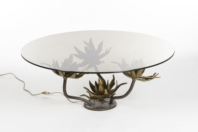 null Paul MOERENHOUT (XX- XXI ème)
Table basse éclairante en bronze à décor de quatre...