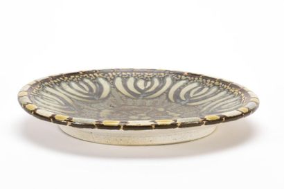 null Adrienne PICARD (1890-1963), Céramiste roannaise
Large plat en céramique émaillée...
