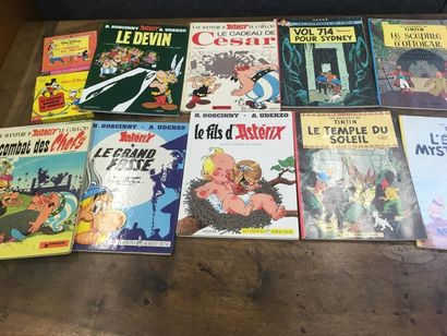 null Lot de 5 Astérix joint 6 albums Tintin couveture souple
Joint 2 dessins animés...