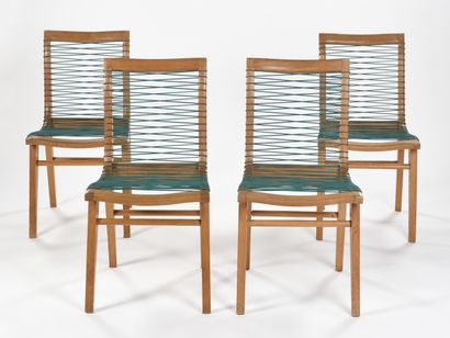 null Louis SOGNOT (1892-1969) 

Suite de quatre chaises à structure en hêtre vernis...