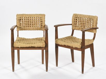 null Adrien AUDOUX & Frida MINET (XXème) 

Paire de fauteuils à structure en hêtre...