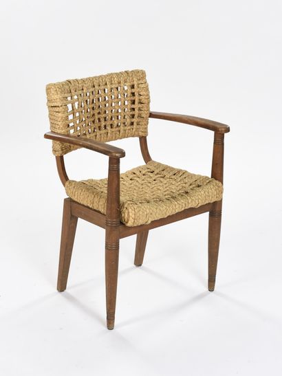 null Adrien AUDOUX & Frida MINET (XXème) 

Paire de fauteuils à structure en hêtre...