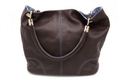 null LANCEL. French Flair. Sac a main en cuir marron souple surpiqué en bleu, interieur...