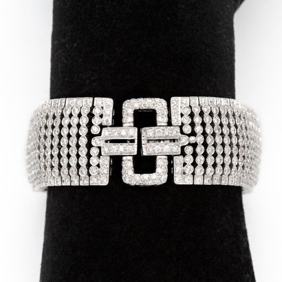 null Bracelet ruban en or blanc (750) 18K pavé de diamants, 

au centre un motif...