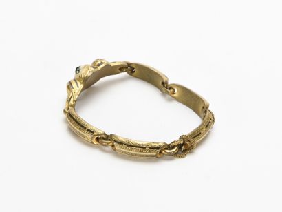 null Bracelet articulé en métal doré orné de pierres de couleur

19ème siècle