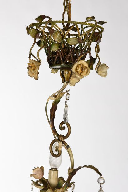null WORK OF 1940

Five lights chandelier in iron and painted sheet metal decorated...
