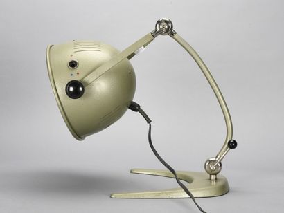 null BELMAG Switzerland

Heating lamp with chromed articulated arm on a green cast...