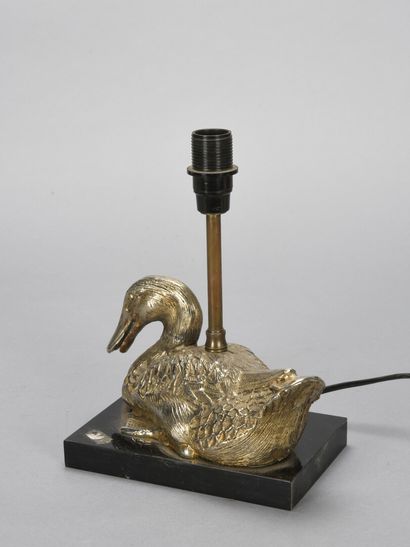 null TRAVAIL 1970

Lampe de table à décor d'un canard nageant reposant sur un socle...