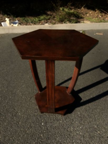 null ART DECO work

Pedestal table with double hexagonal trays connected by three...