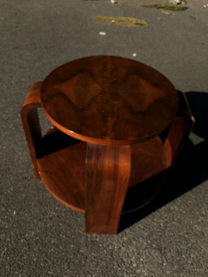 null ART DECO work

Circular pedestal table with two trays and a large tripod base...