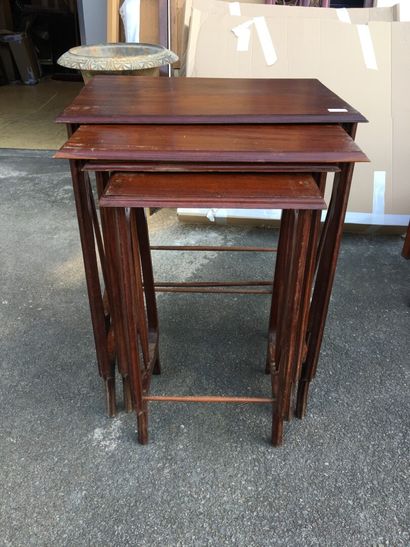 null ART NOUVEAU WORK 

Set of four dark stained wood nesting tables.

Circa 1920.

H:...