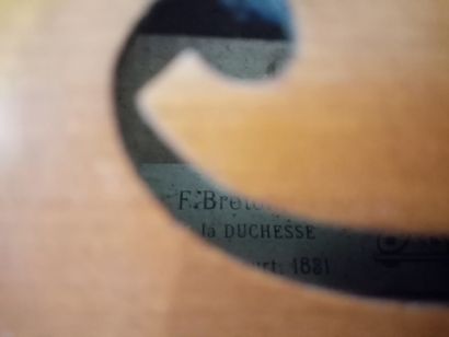 null F. Breton, Violon avec son archet dans son étui 

(étiquette F. Breton, breveté...