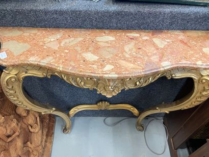 null Console en bois doré plateau marbre rose mouvementé de style Louis XV

H : 87...
