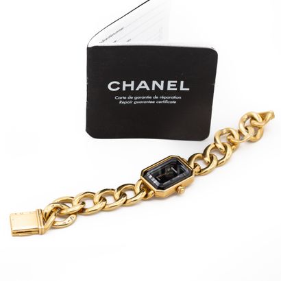 null CHANEL Ma Première". Montre de dame. Boîtier et bracelet en or jaune (750) 18K,...