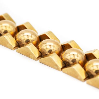 null Bracelet tank en or jaune (750) 18K, suite de douze demi-perles d'ors entre...