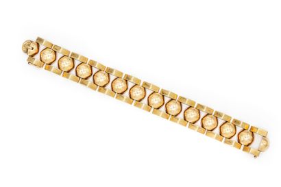 null Bracelet tank en or jaune (750) 18K, suite de douze demi-perles d'ors entre...