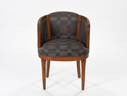null In the spirit of Paul FOLLOT

Armchair with solid mahogany structure and armrests...