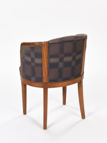 null In the spirit of Paul FOLLOT

Armchair with solid mahogany structure and armrests...