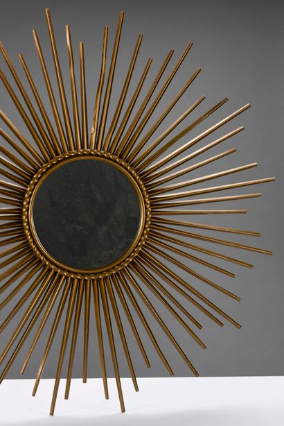 null CHATY VALLAURIS

Sun mirror with central glass and gilded metal frame.

Signature...