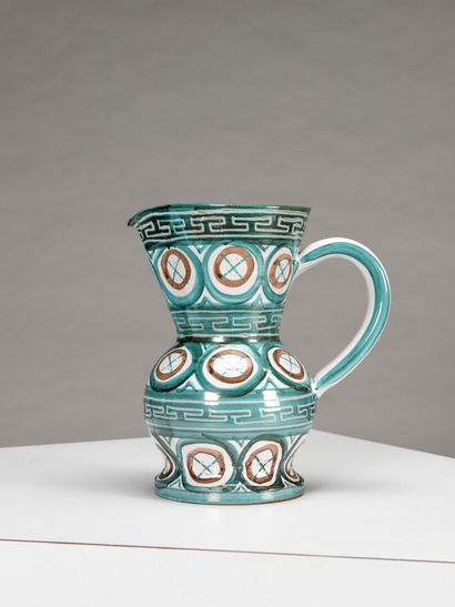 null Robert PICAULT (1919 - 2000)

Large pitcher with one handle in polychrome enamelled...