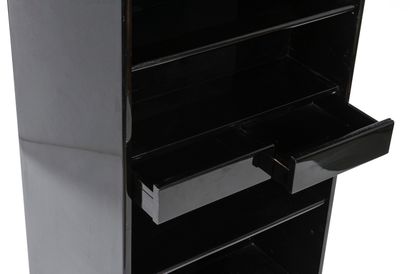 null ARFLEX ITALIA

Double sided swivel bookcase in black lacquer with square cast...