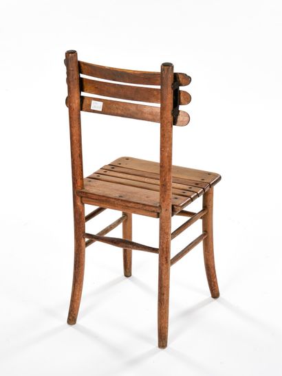 null FRENCH WORK

Chair with beechwood structure, cast iron hinged back and wooden...