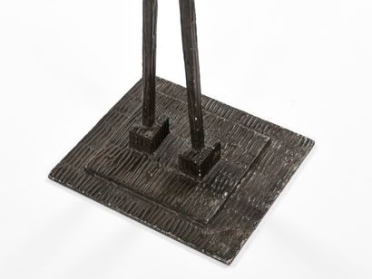 null workshop work

Coat rack in patinated iron showing a man standing and lifting...