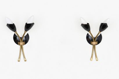 null ITALIAN WORK

Pair of sconces with circular base in black gilded lacquered metal...
