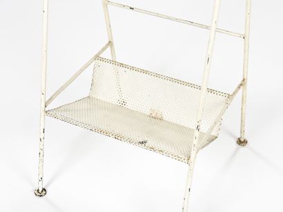 null In the spirit of Mathieu MATEGOT

Telephone holder in perforated metal.

Circa...