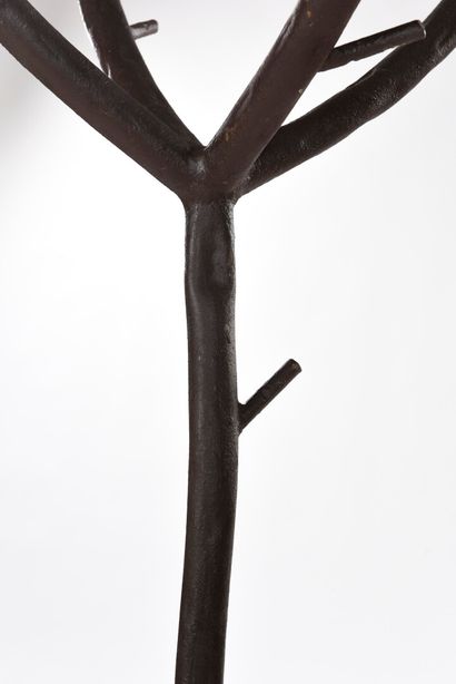  WORK 1940 
Quadripod coat rack representing a tree in brown painted wrought iron....