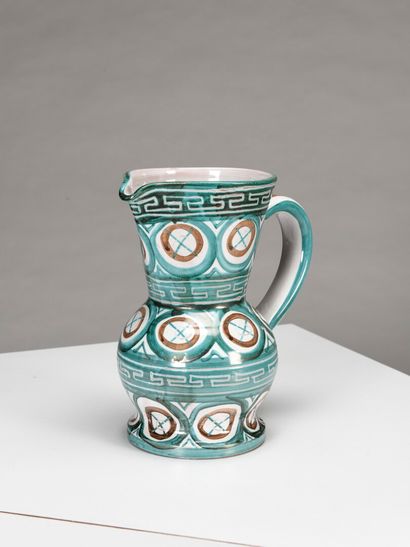 null Robert PICAULT (1919 - 2000)

Large pitcher with one handle in polychrome enamelled...