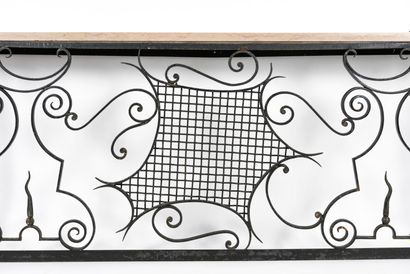 null WORK OF 1940

A console radiator cover with a front decorated with wrought iron...