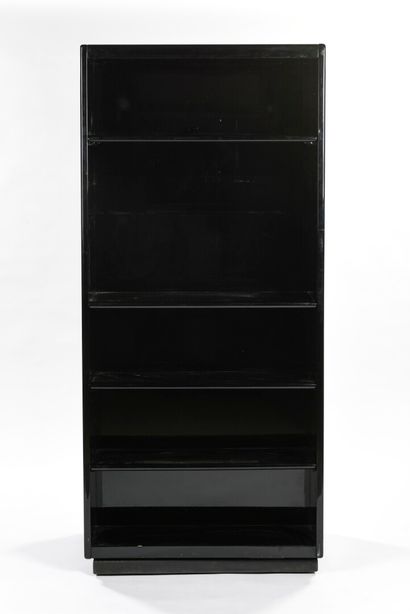null ARFLEX ITALIA

Double sided swivel bookcase in black lacquer with square cast...