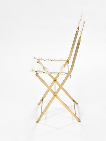 null Yonel LEBOVICI (1937-1998) 



Chaise pliante à structure en métal doré à assise...