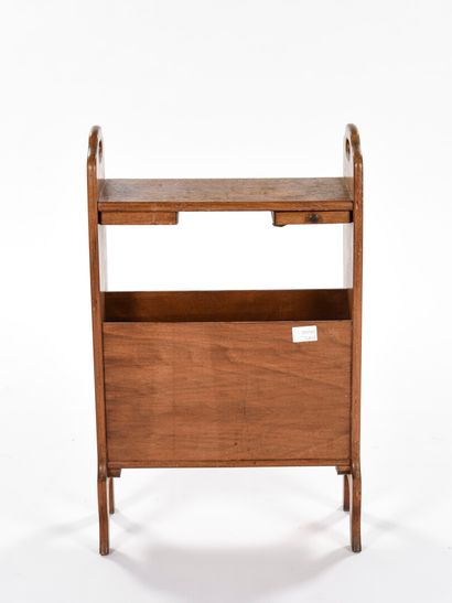 null WORK OF 1950

Mahogany magazine rack with a tray and two gilded brass cubbies...