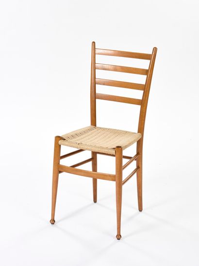 null WORK 1960



Suite of three chairs with solid beech structure, backrest with...