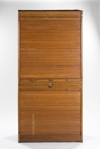 null Light oak curtain cabinet 

In two parts 

The curtain uncovers compartments...