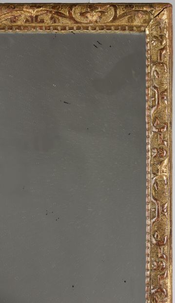 null Rectangular mirror in gilded wood, molded and carved

18th century

66 x 45.5...