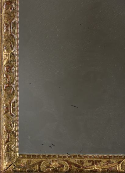null Rectangular mirror in gilded wood, molded and carved

18th century

66 x 45.5...