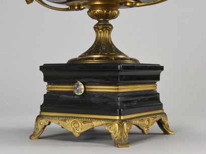 null Cup on high foot "tazza" in black marble underlined by a net of cloisonne bronze....