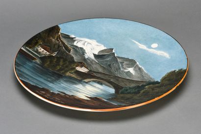 null Large circular dish showing the Mont Blanc seen from the Saint Martin bridge

Porcelain...
