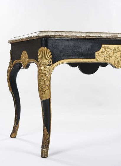 null Important console in carved and gilded wood, black lacquered 

Stone top inlaid...