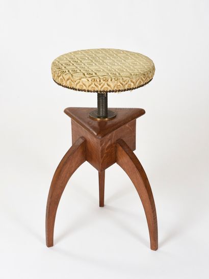  Vincent GONZALEZ (1928-2019) 
Piano stool with three carved wooden legs joined by...