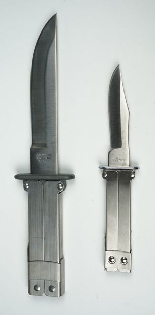null Un lot de deux couteaux de même conception : 



Un couteau pliant de marque...