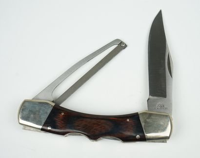 null Un couteau de marque SCHLIEPER, à double lame. Une lame de couteau de 9 cm,...