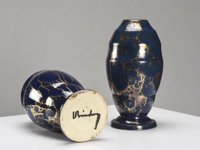null Lucien BRISDOUX (1878-1973)

Pair of midnight blue enamelled ceramic vases decorated...